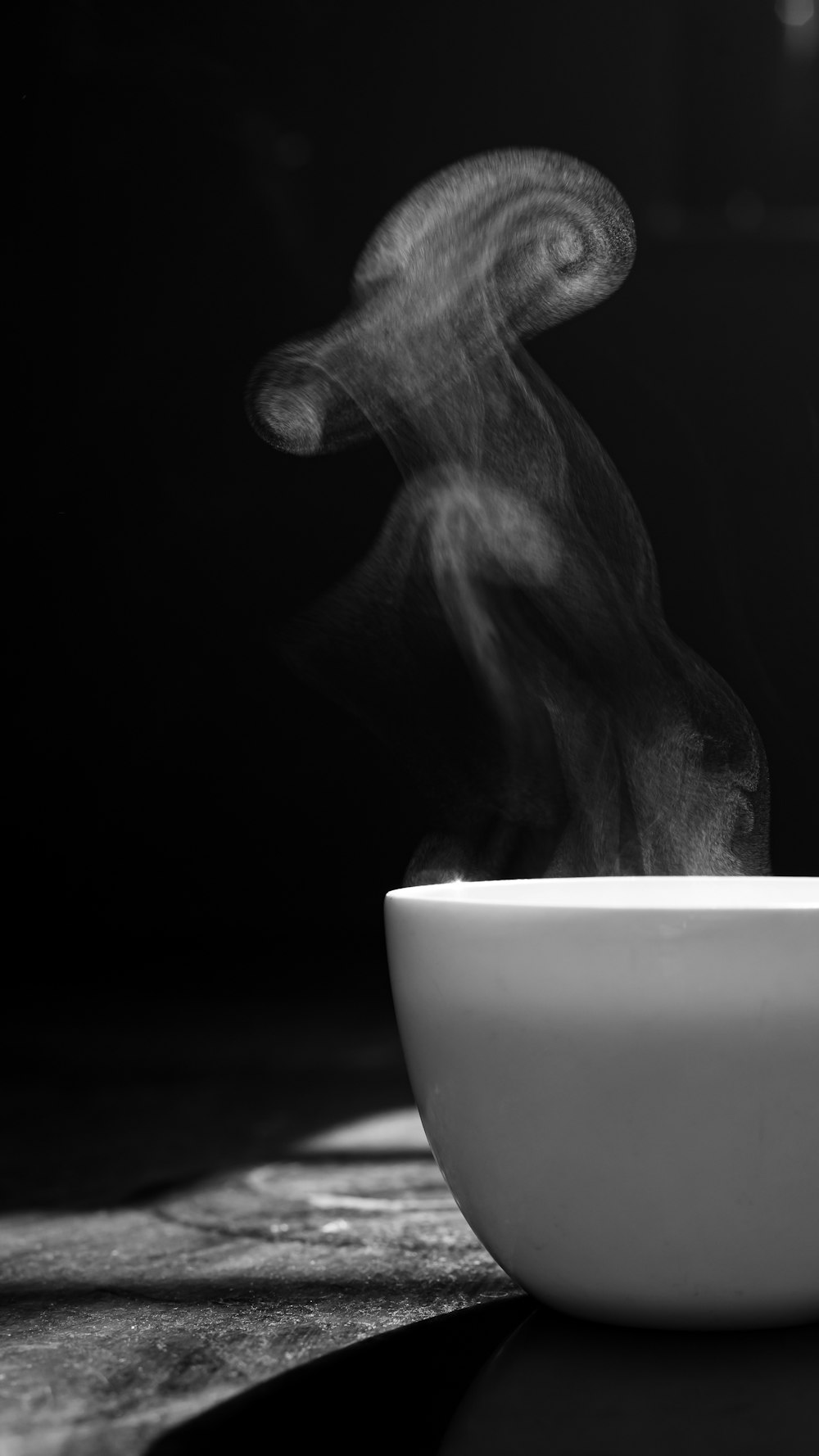 white ceramic cup with white liquid