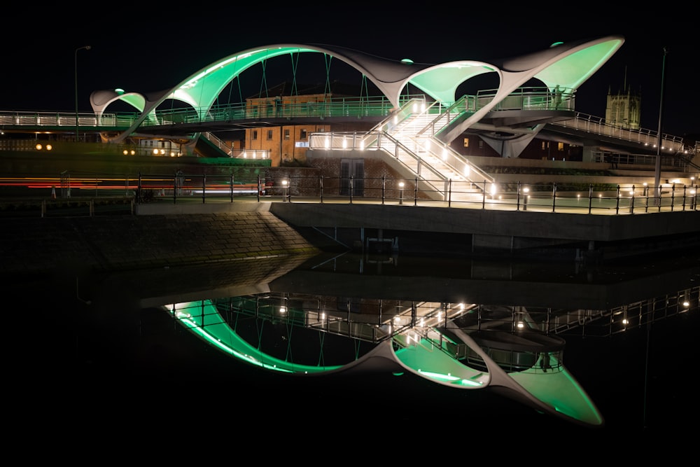 white and green concrete building during night time