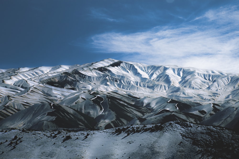 snow covered mountain under blue sky during daytime