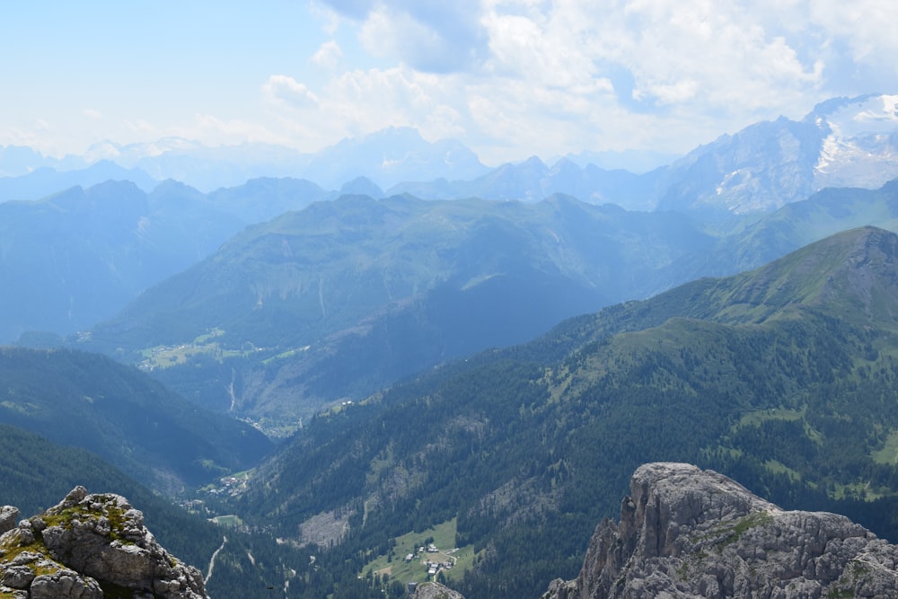 green mountains under white clouds during daytime