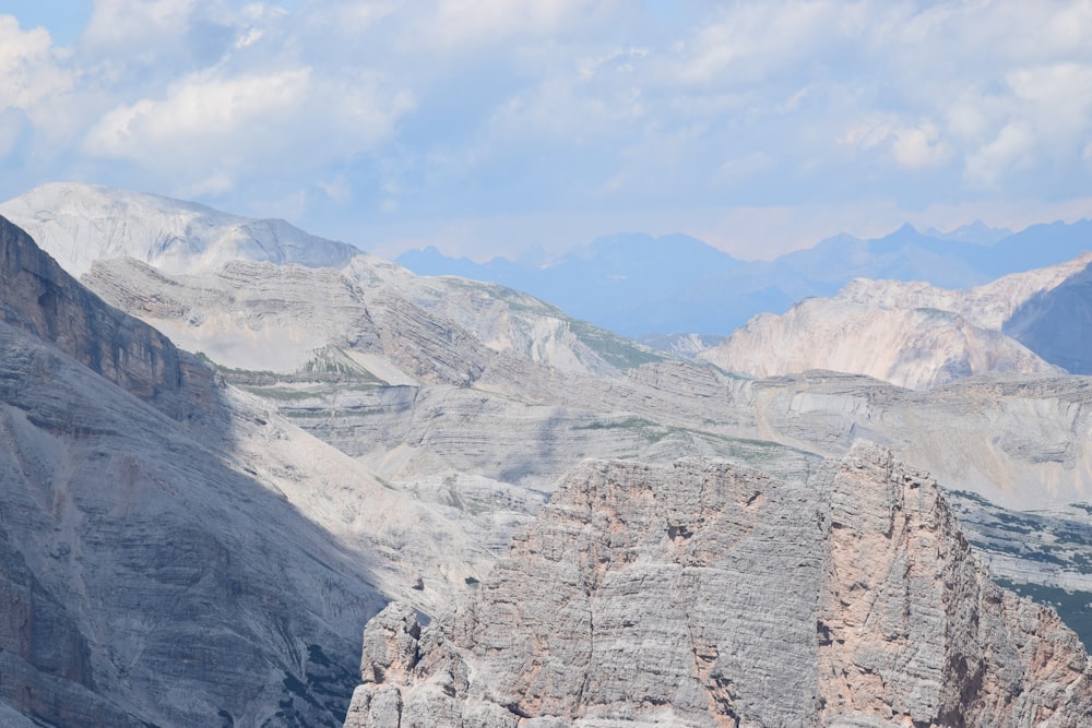 gray rocky mountain under blue sky during daytime