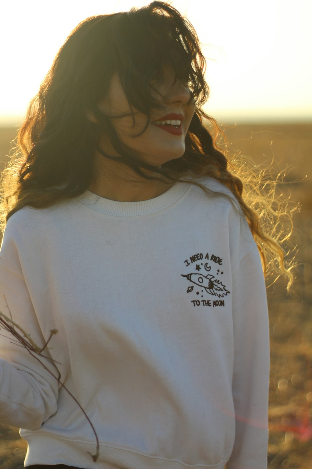 woman in white crew neck shirt wearing black framed eyeglasses