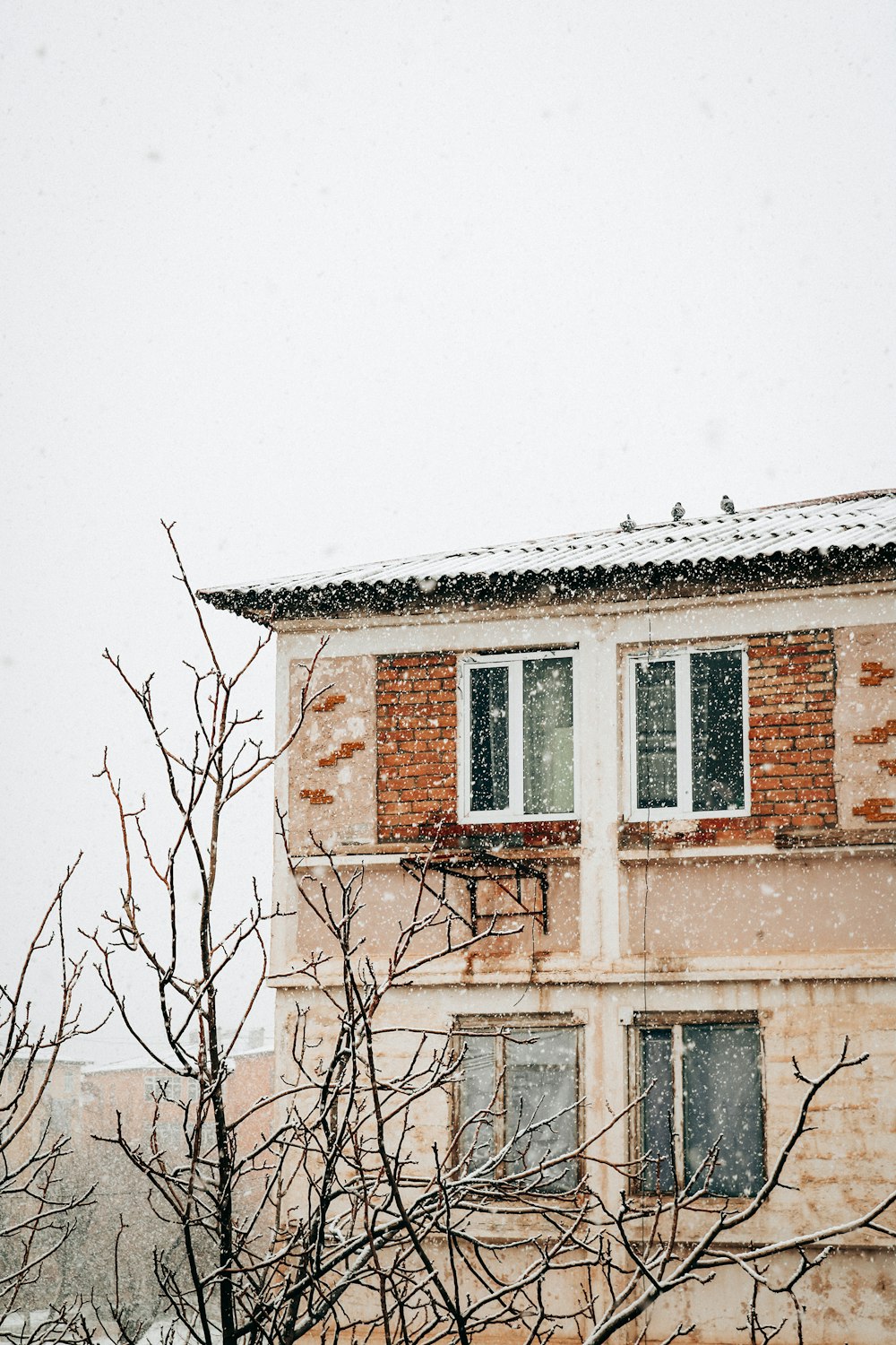 brown concrete building under white sky during daytime