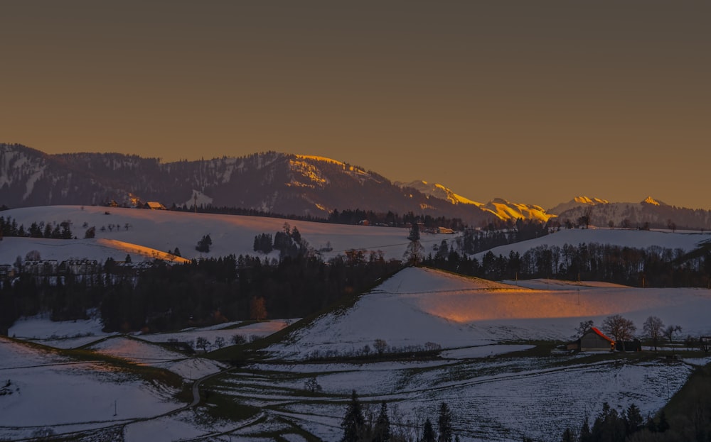 snow covered mountains during daytime