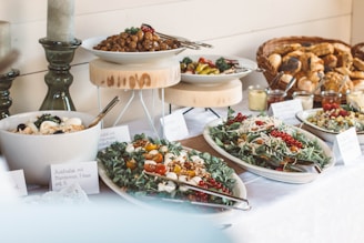 assorted food on white ceramic plates