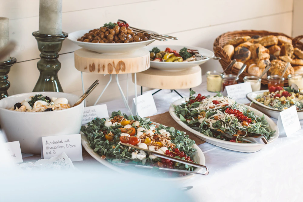 Assorted catering dishes on plates