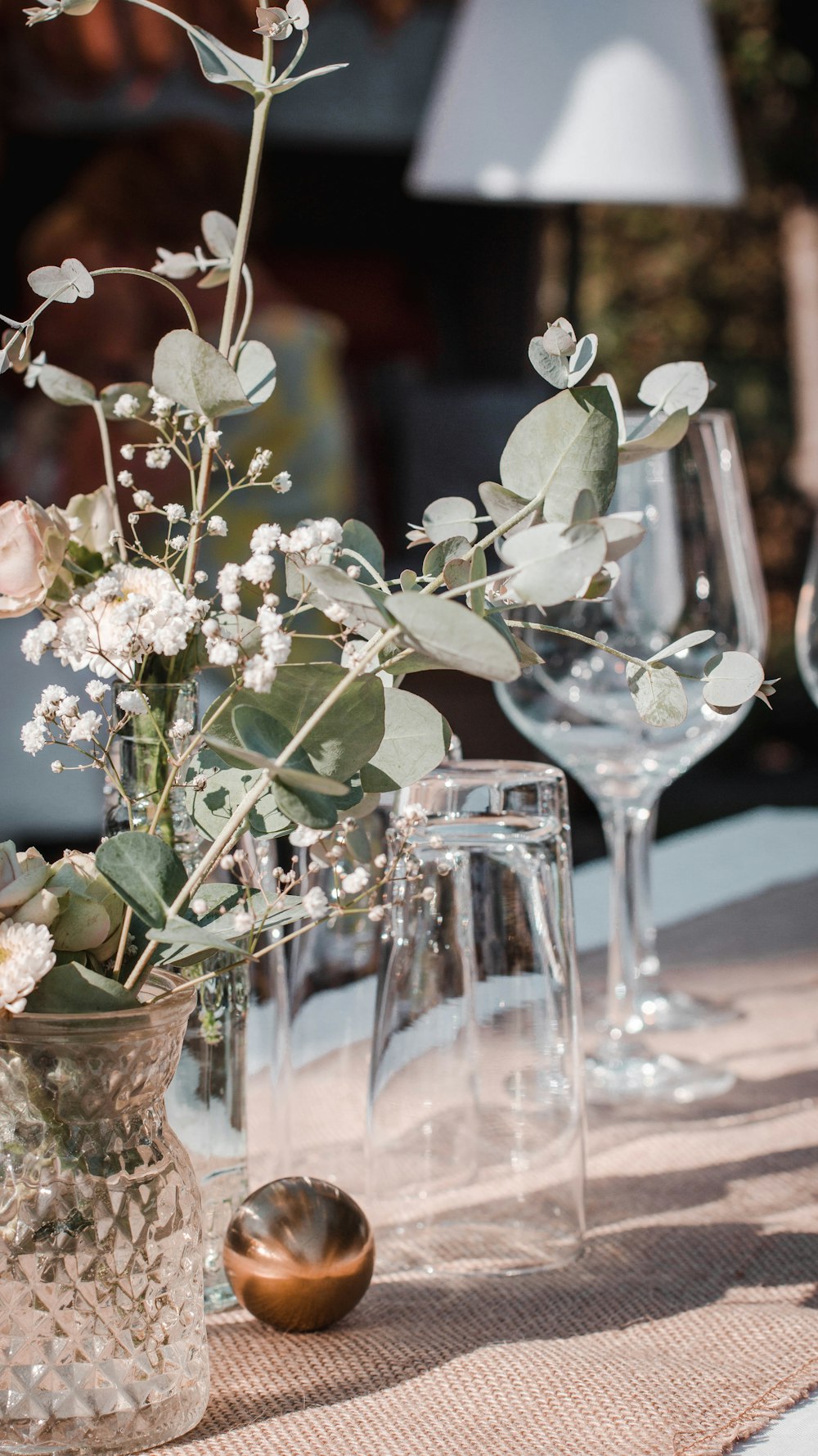 white flowers in clear glass vase