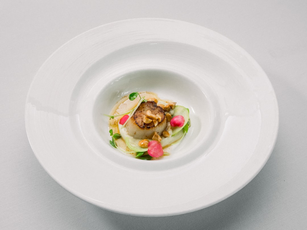 white ceramic plate with vegetable salad, Mozaic is A Fresh Oasis Amongst Restaurant Gastronomique in Bali