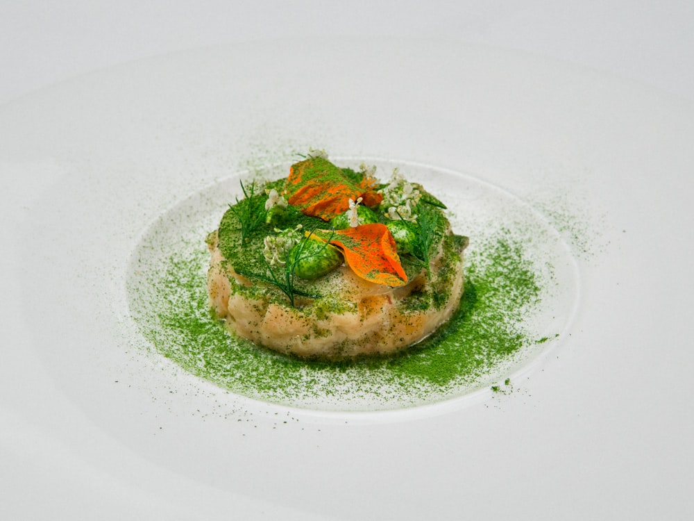 green vegetable on white ceramic plate