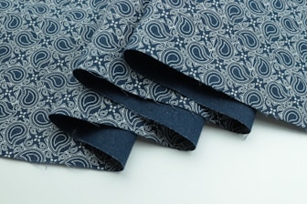 blue and white floral textile
