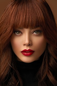 woman with red hair and black lipstick