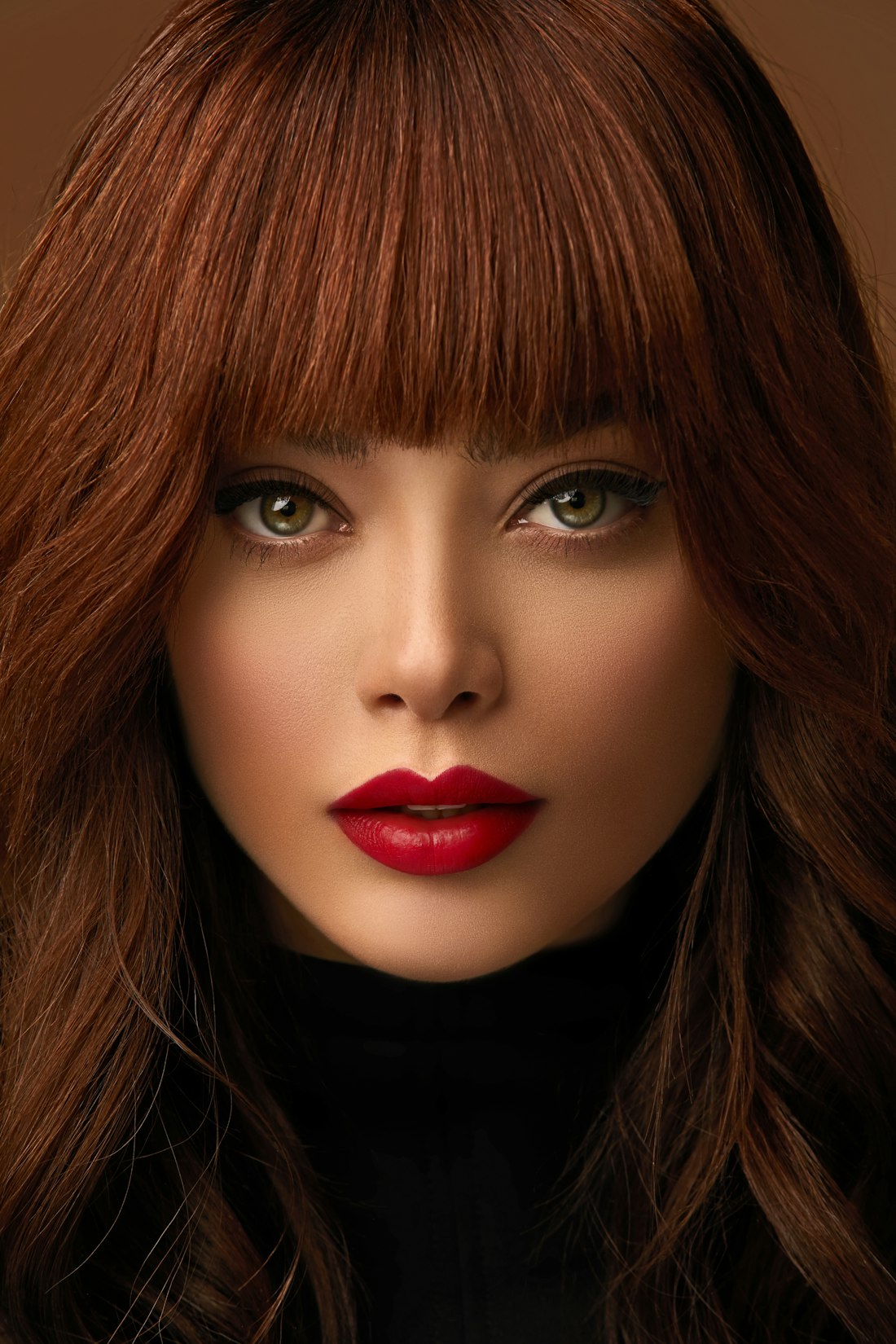 Editorial glam model with a dramatic styled fringe wig look.