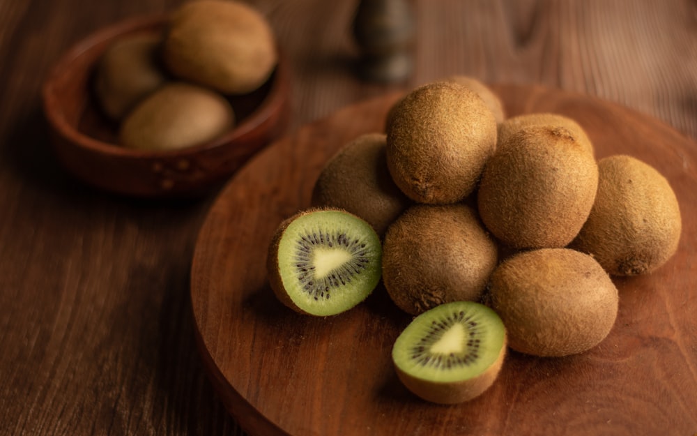 brown round fruit on brown wooden table