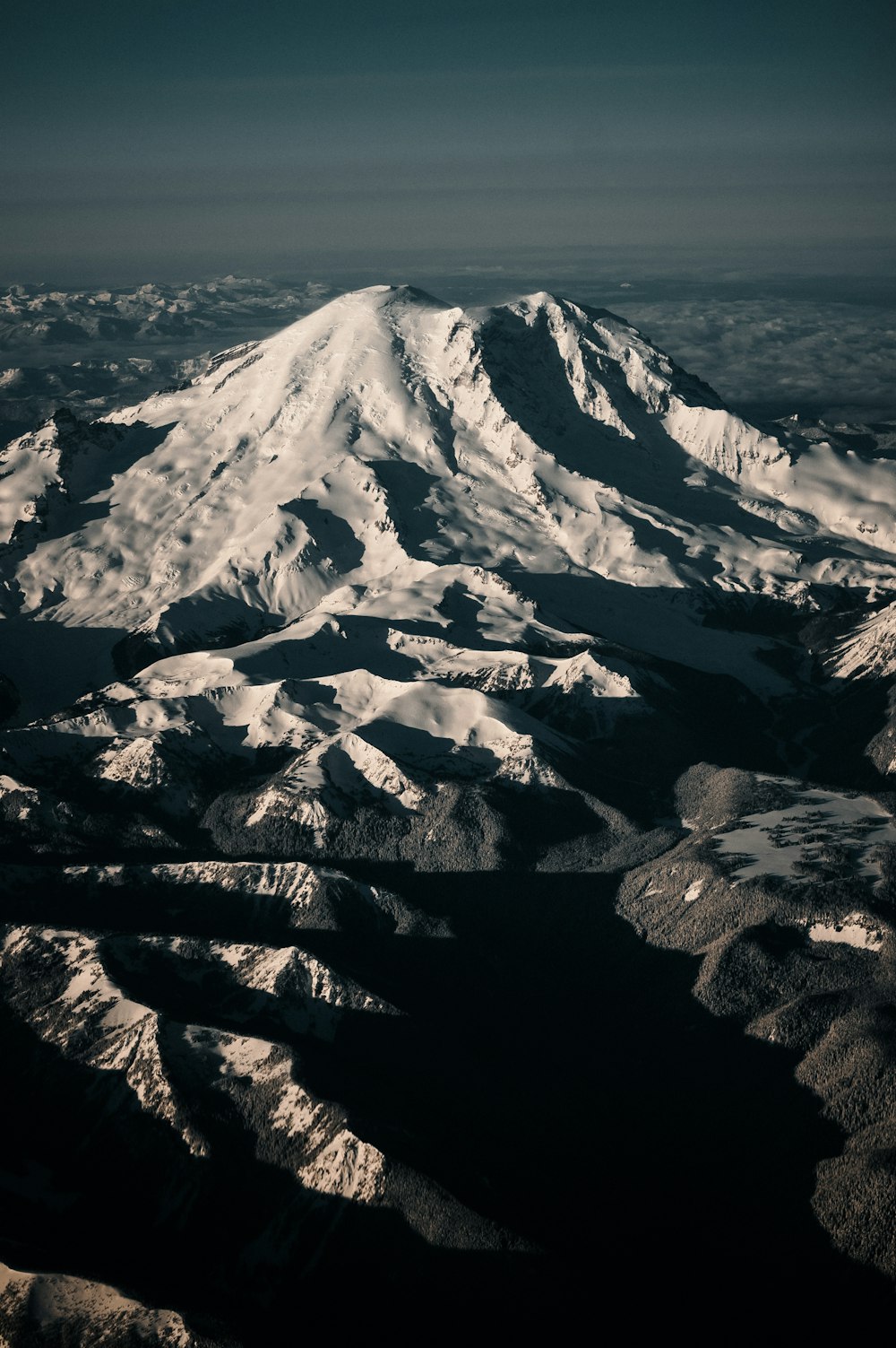 snow covered mountain during daytime