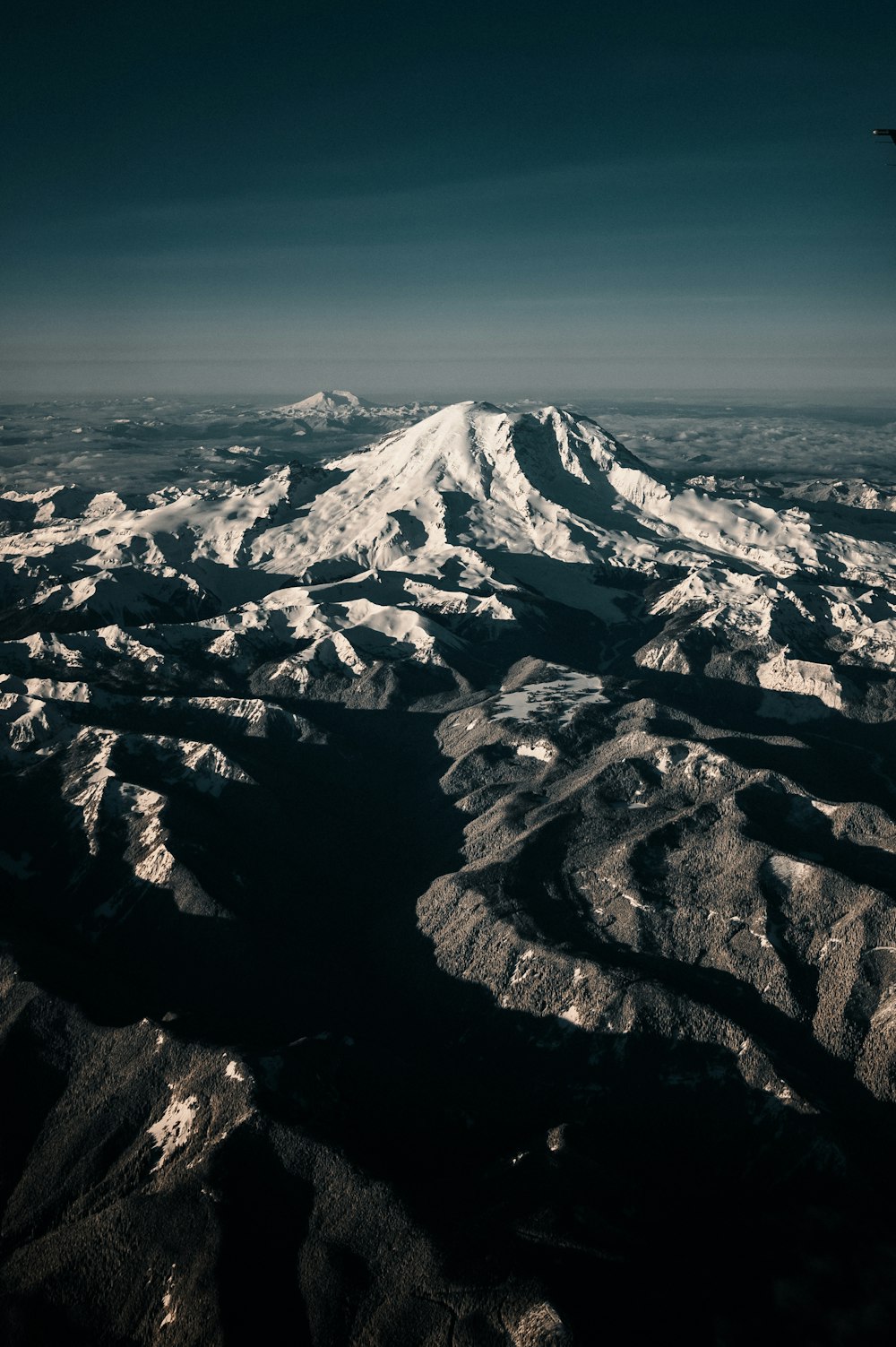 snow covered mountain during daytime