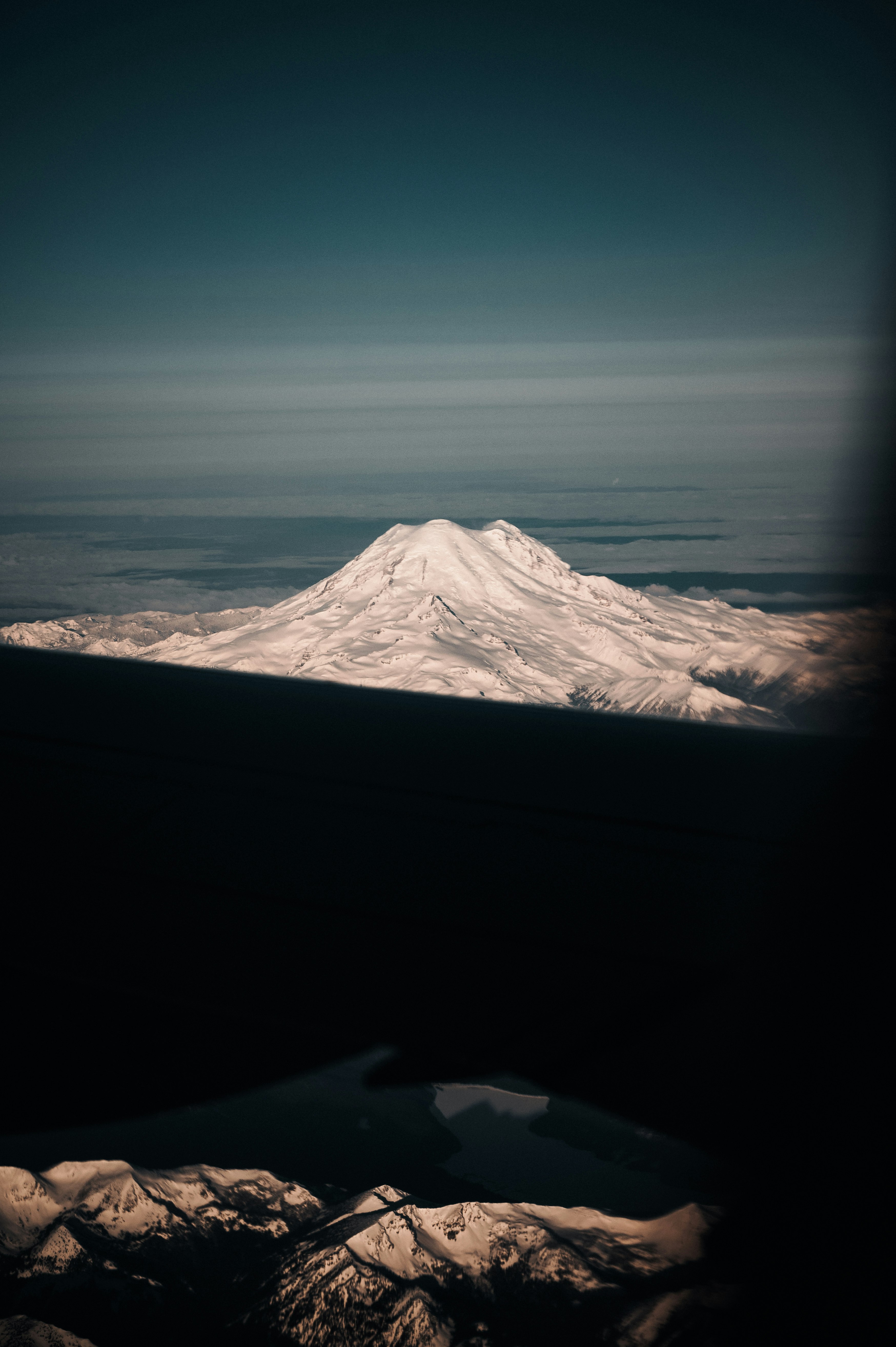 snow covered mountain during daytime