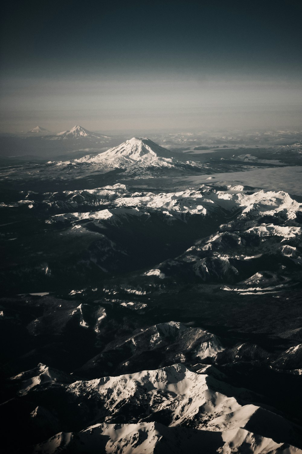 snow covered mountain during daytime