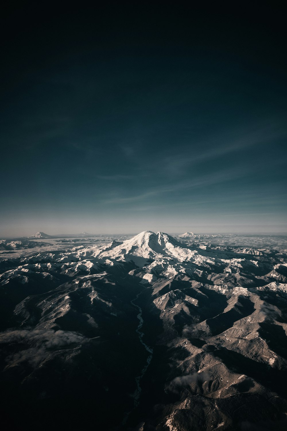 snow covered mountain under blue sky during daytime