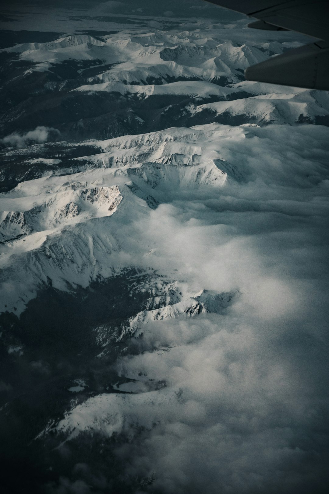 snow covered mountain during daytime