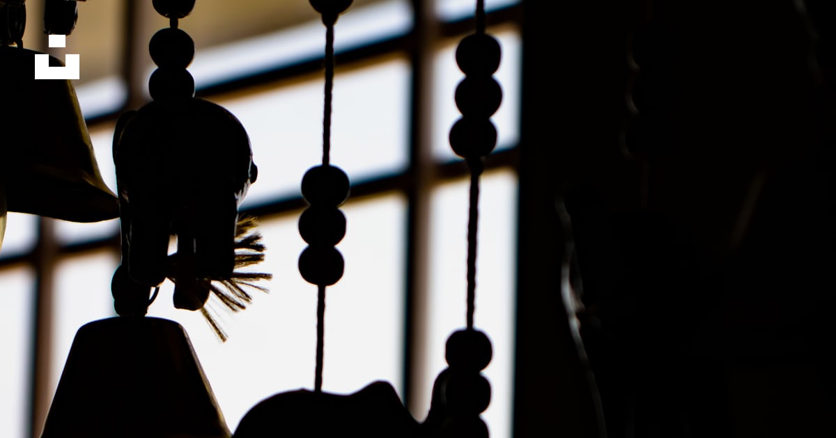 Silhouette of 2 person hanging on bell photo – Free Elephants Image on