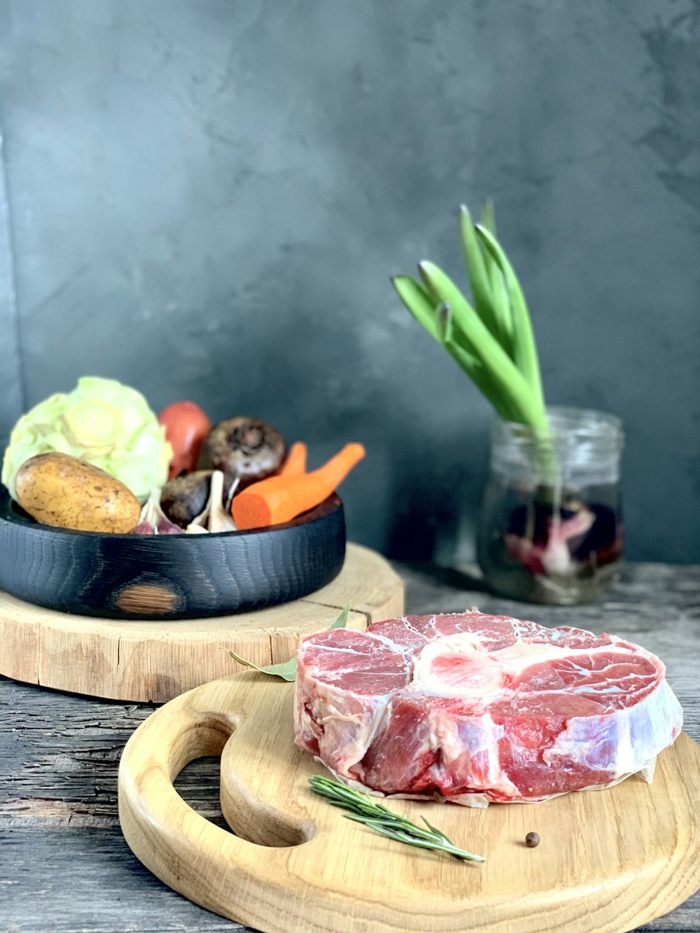 raw meat on brown wooden chopping board