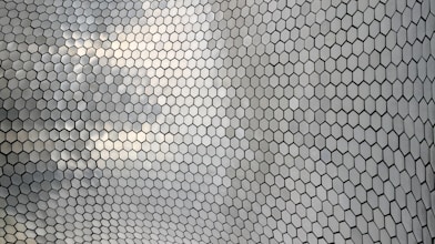 white and black polka dot textile