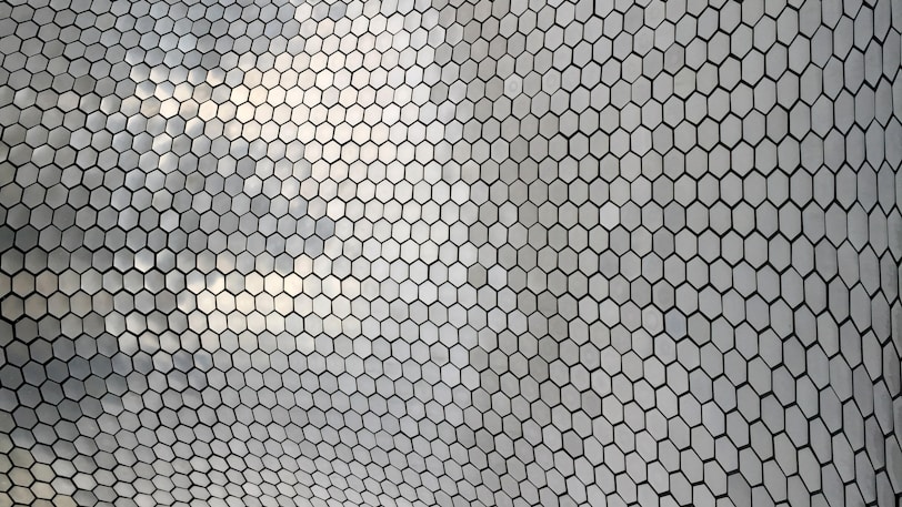 white and black polka dot textile