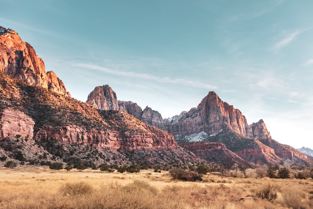 brown rocky mountain under blue sky during daytime