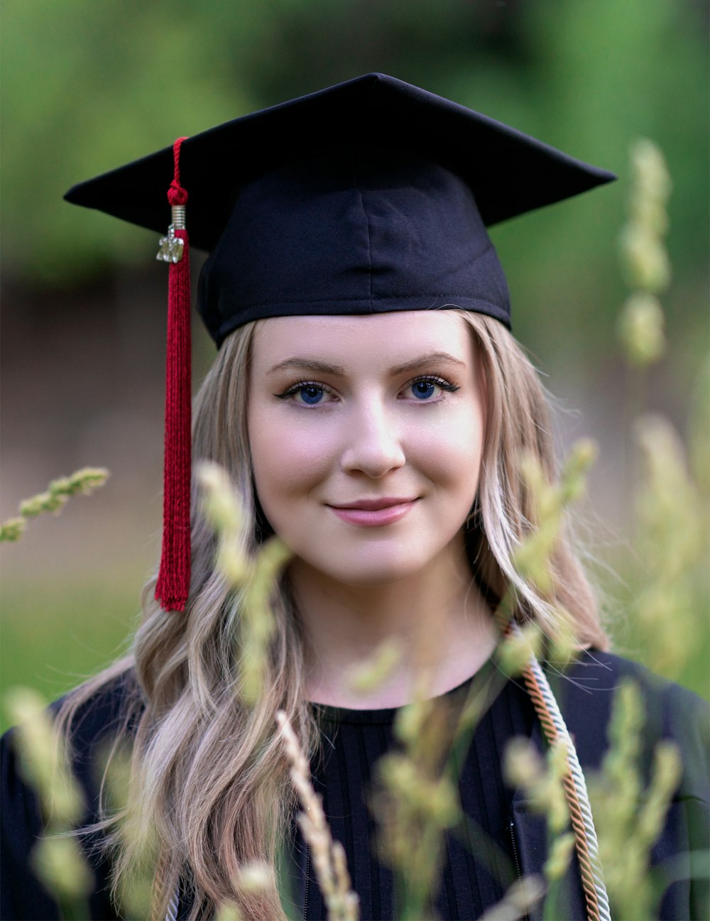 smiling girl wearing academic dress