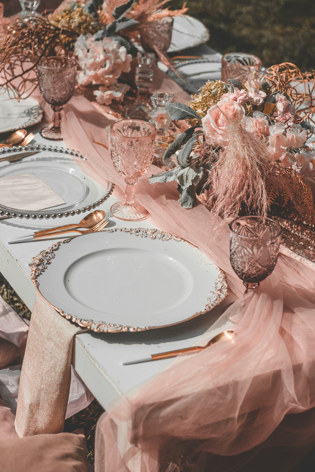 pink and white floral table cloth