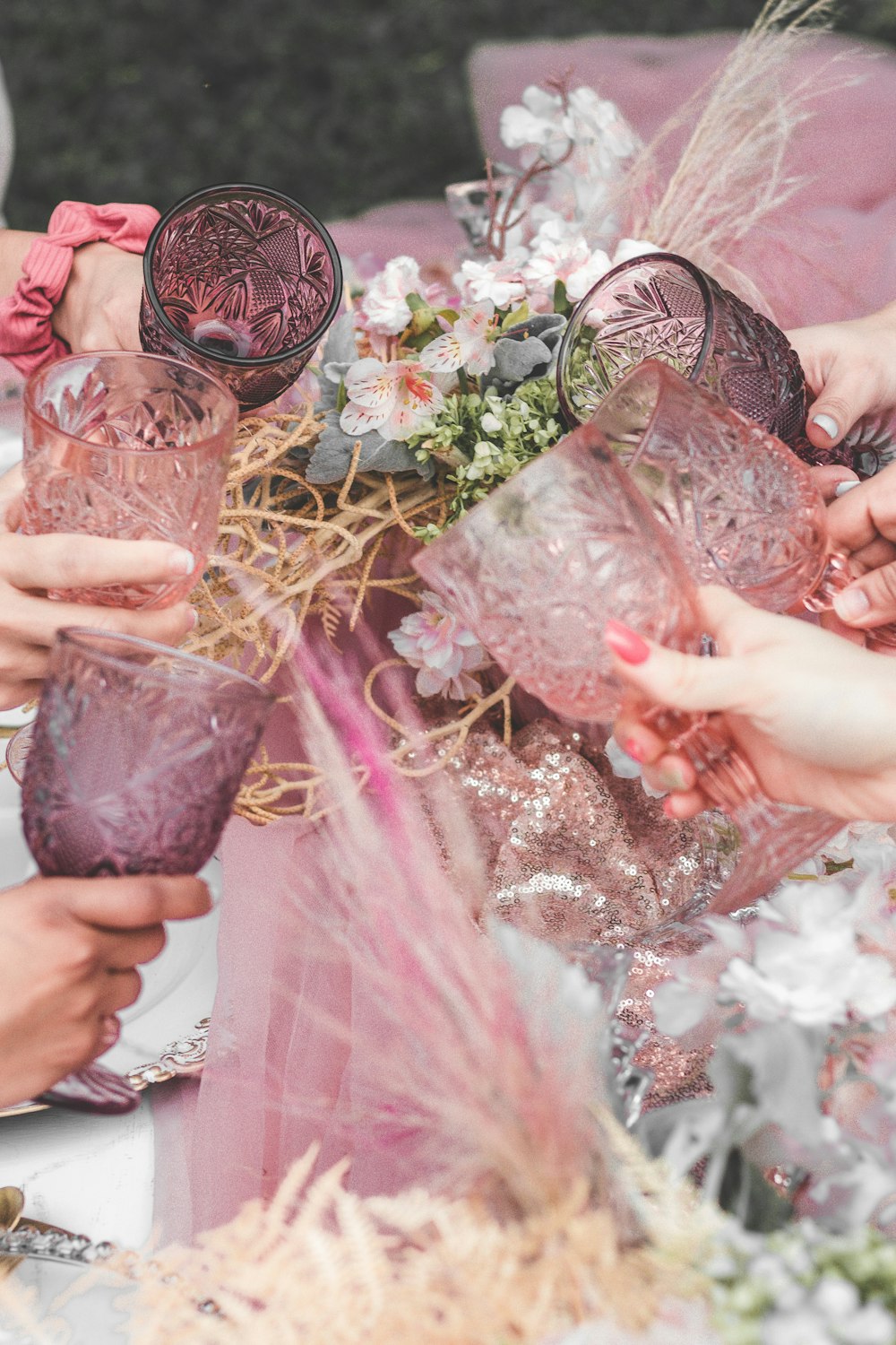 person holding clear drinking glass