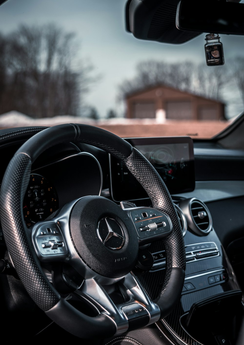 black and gray bmw steering wheel