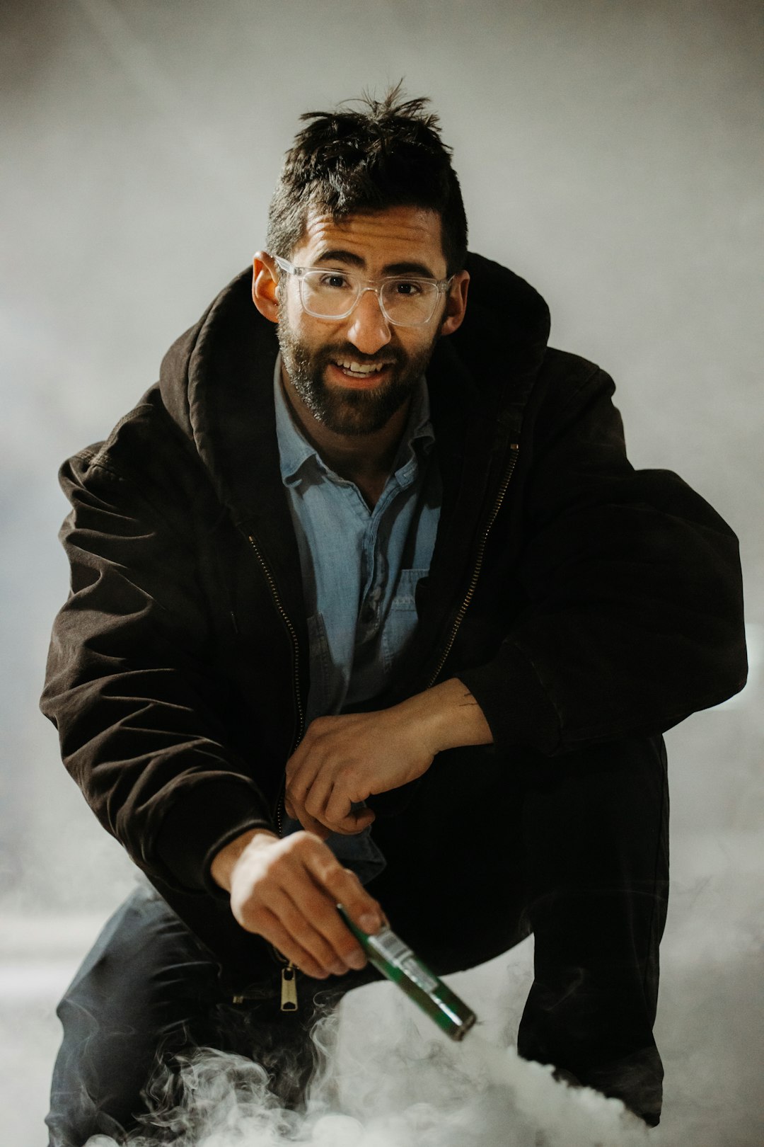 man in black jacket smiling