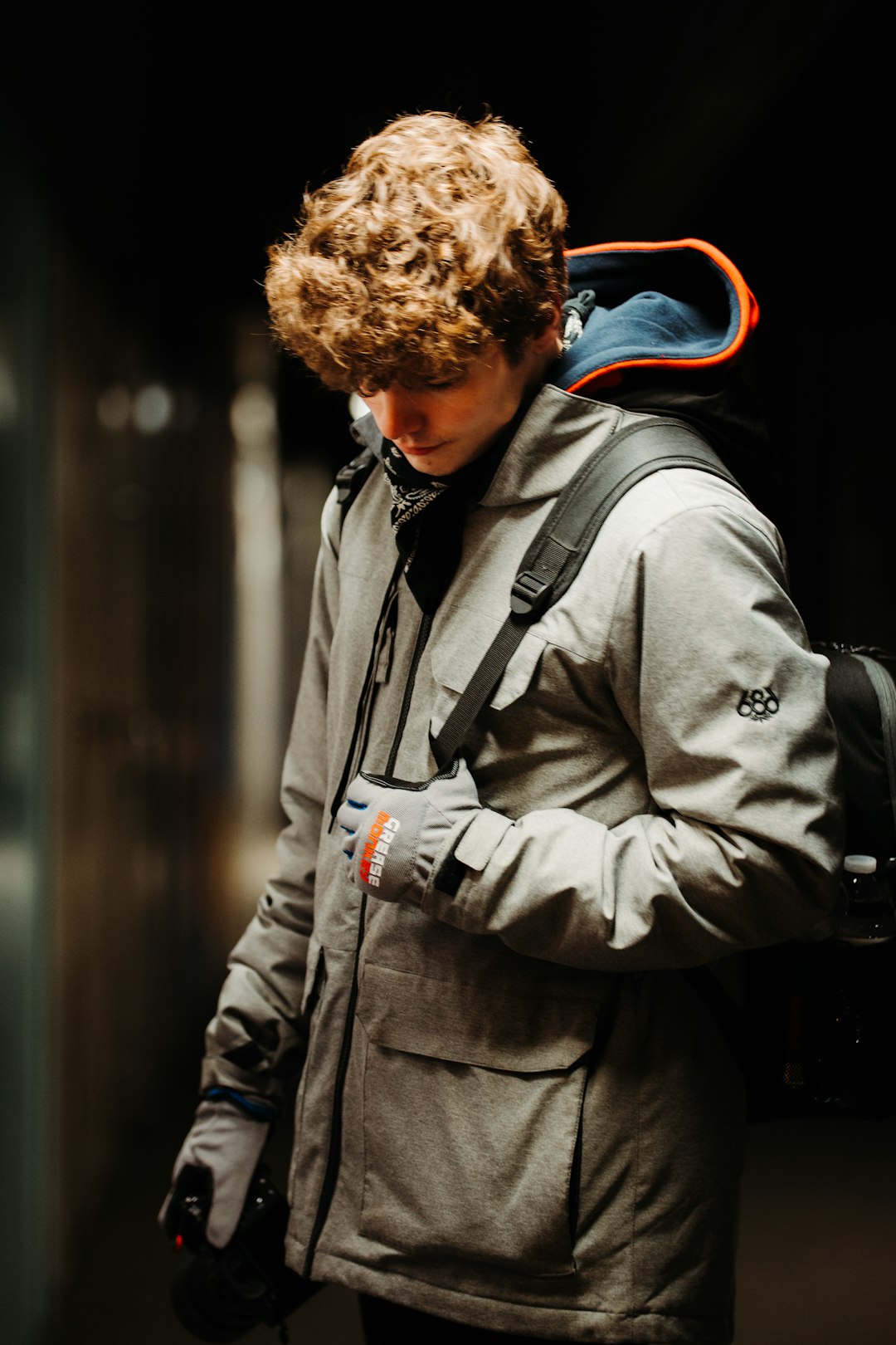 man in gray coat standing