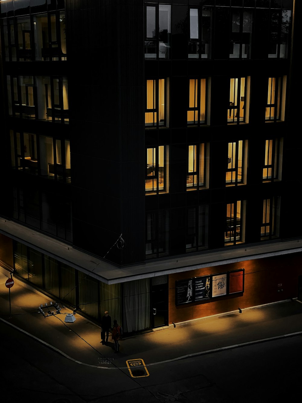 black and brown building during night time