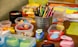 assorted color pencils in clear plastic container