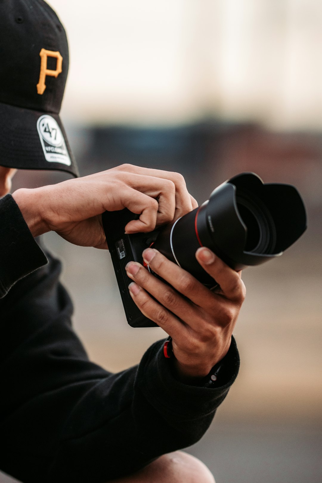 person holding black dslr camera