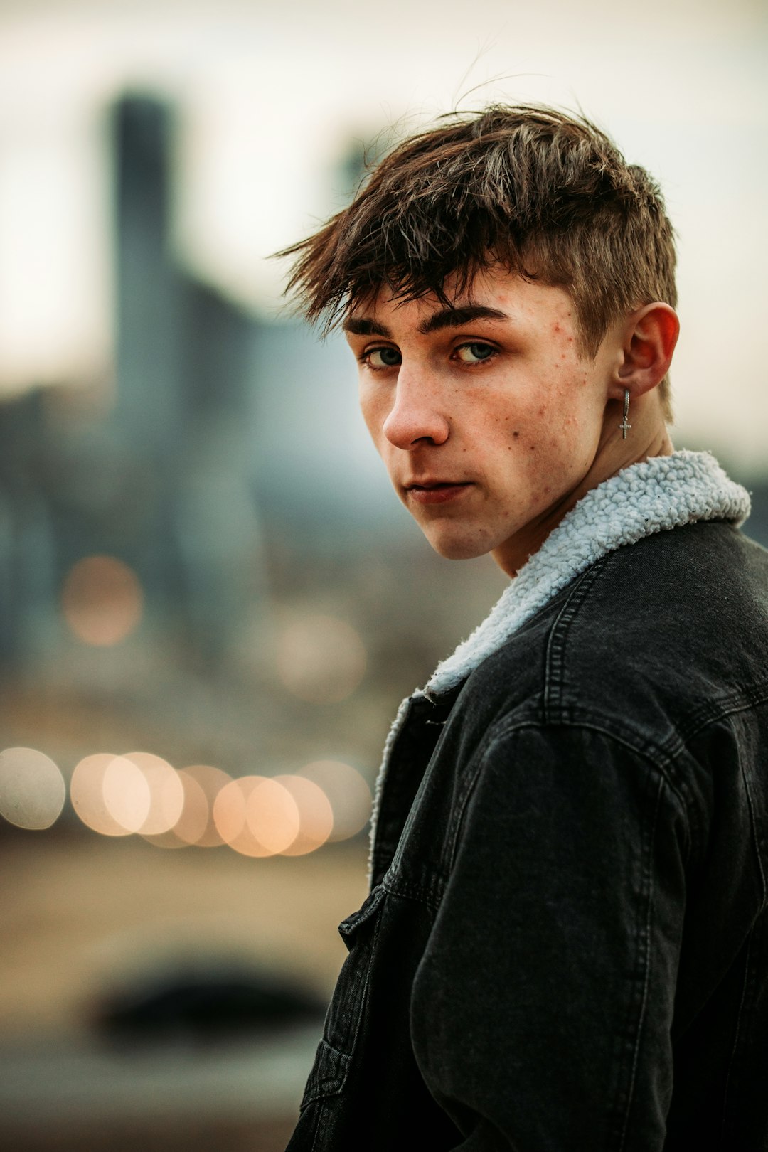 man in black leather jacket