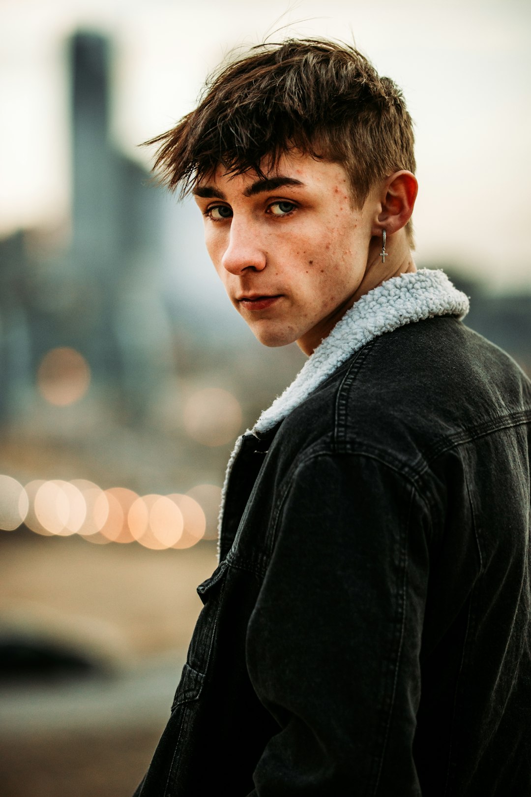 man in black leather jacket