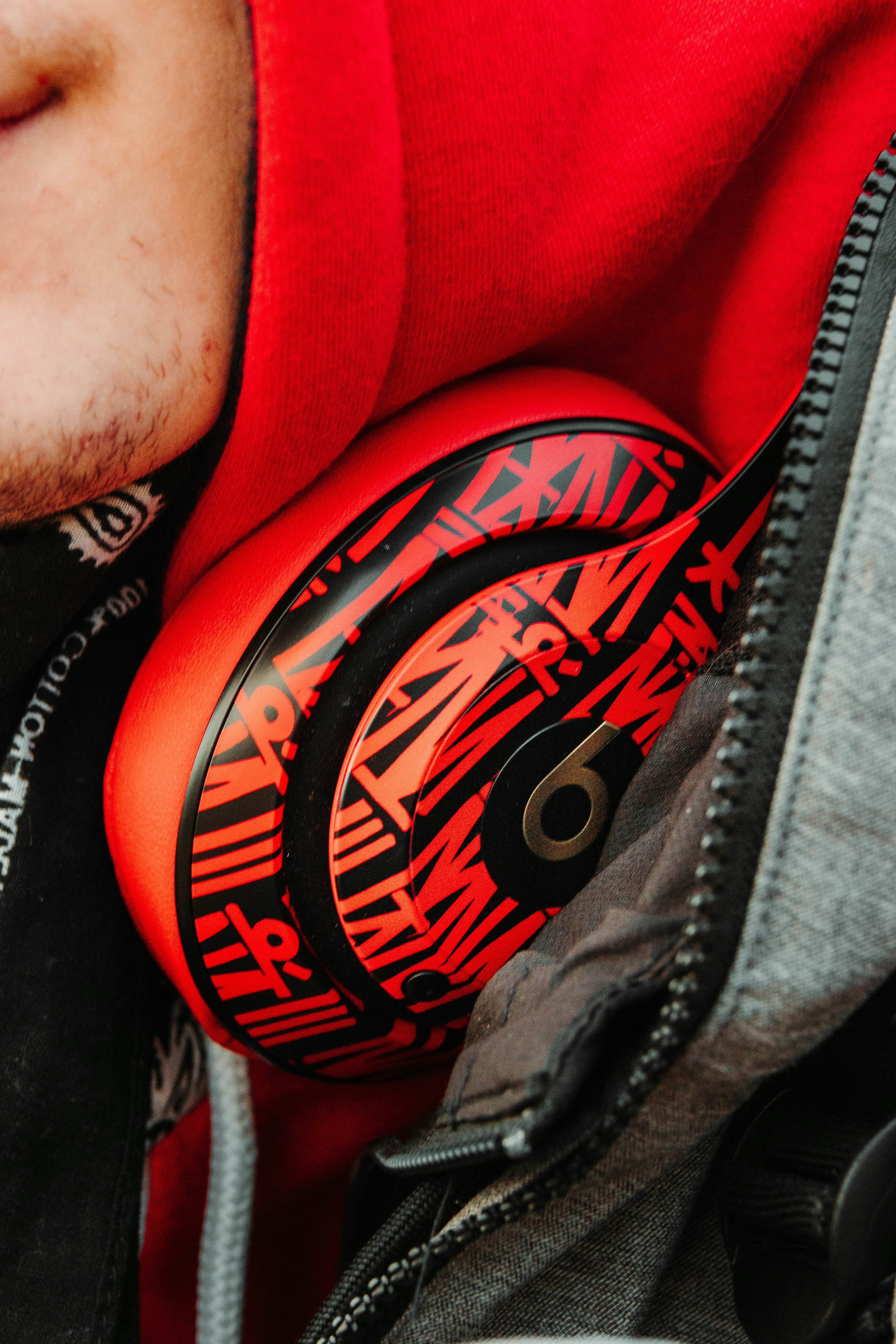 Person in red and black zip up jacket photo Free Apparel Image on