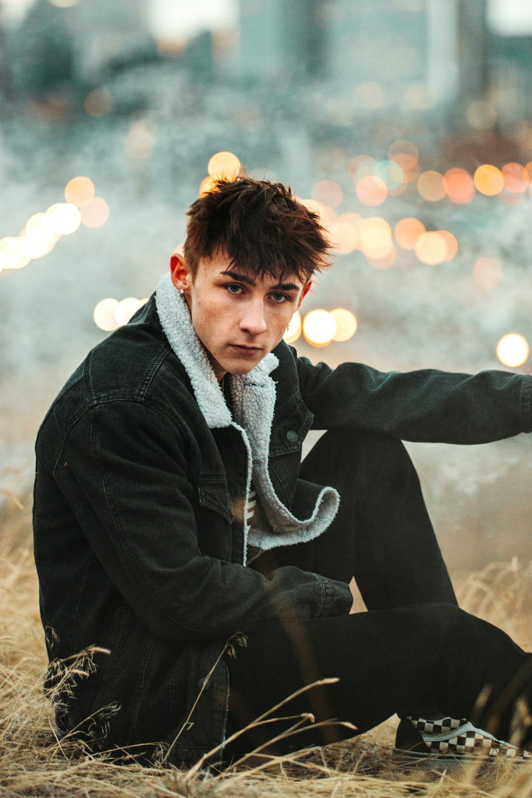 man in black jacket and gray scarf