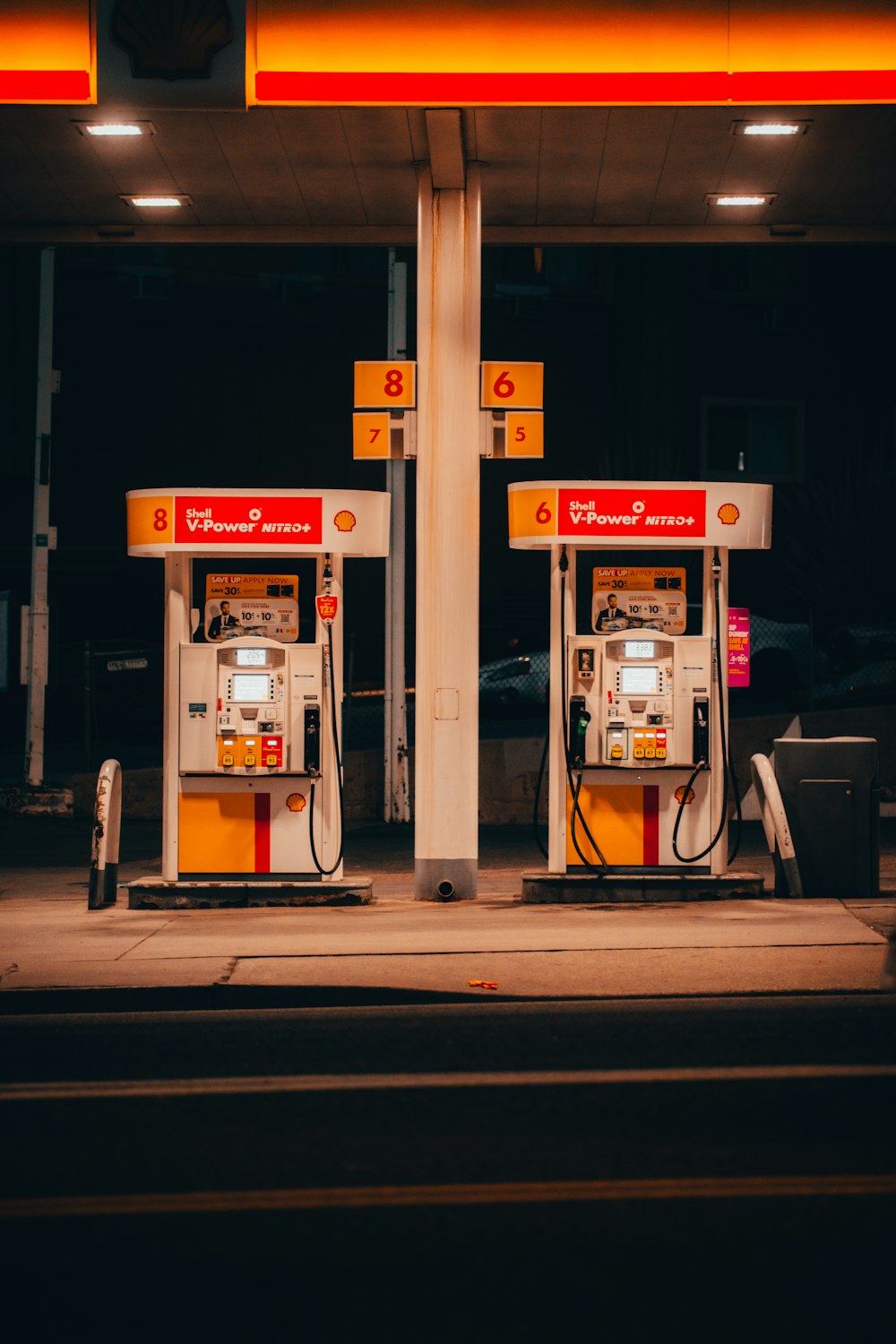 white and red gas pump