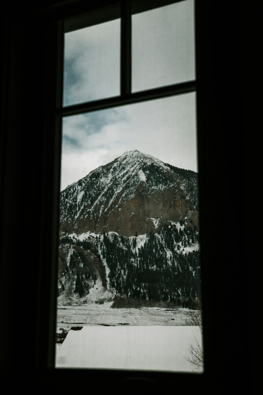 snow covered mountain during daytime