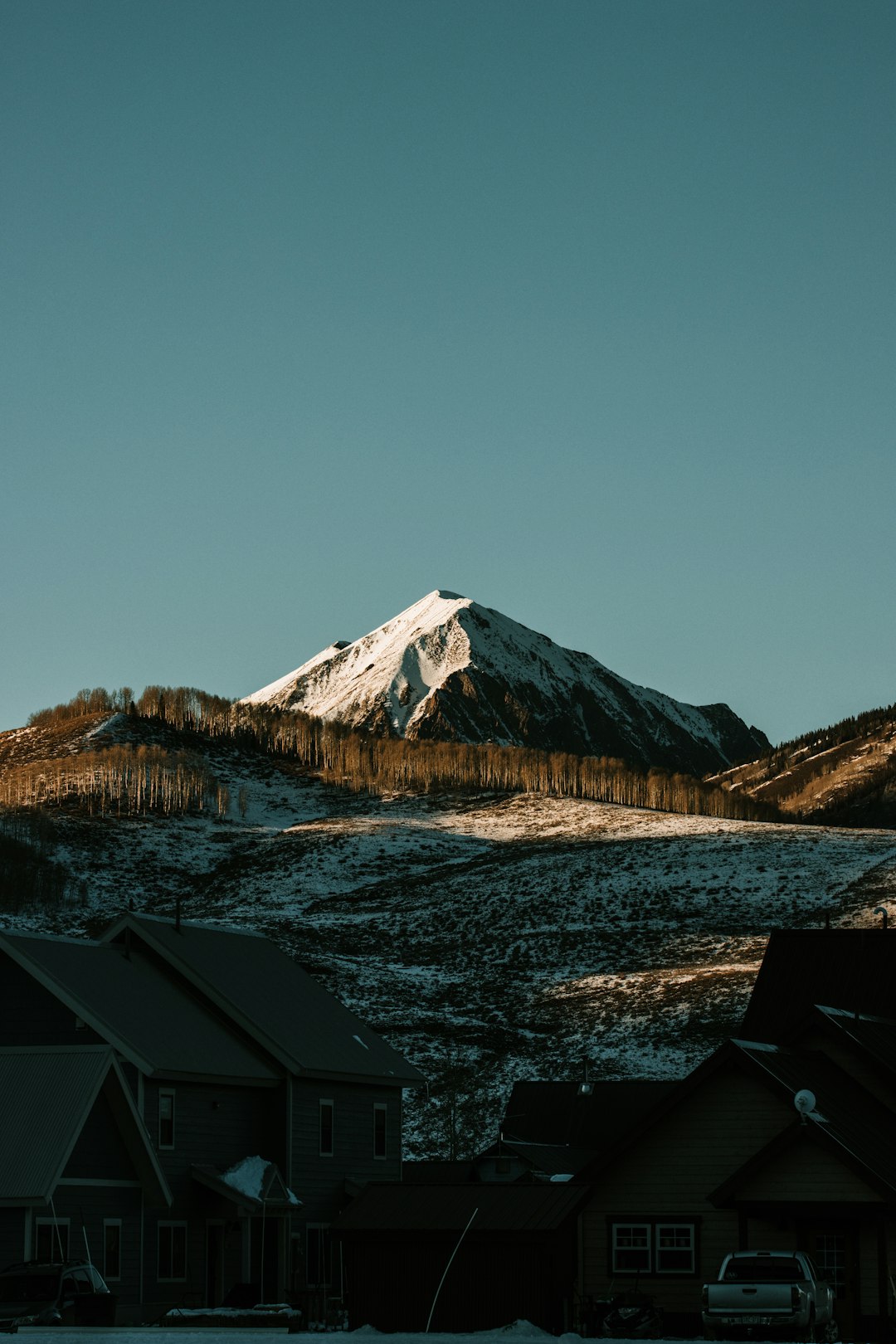 snow covered mountain during daytime