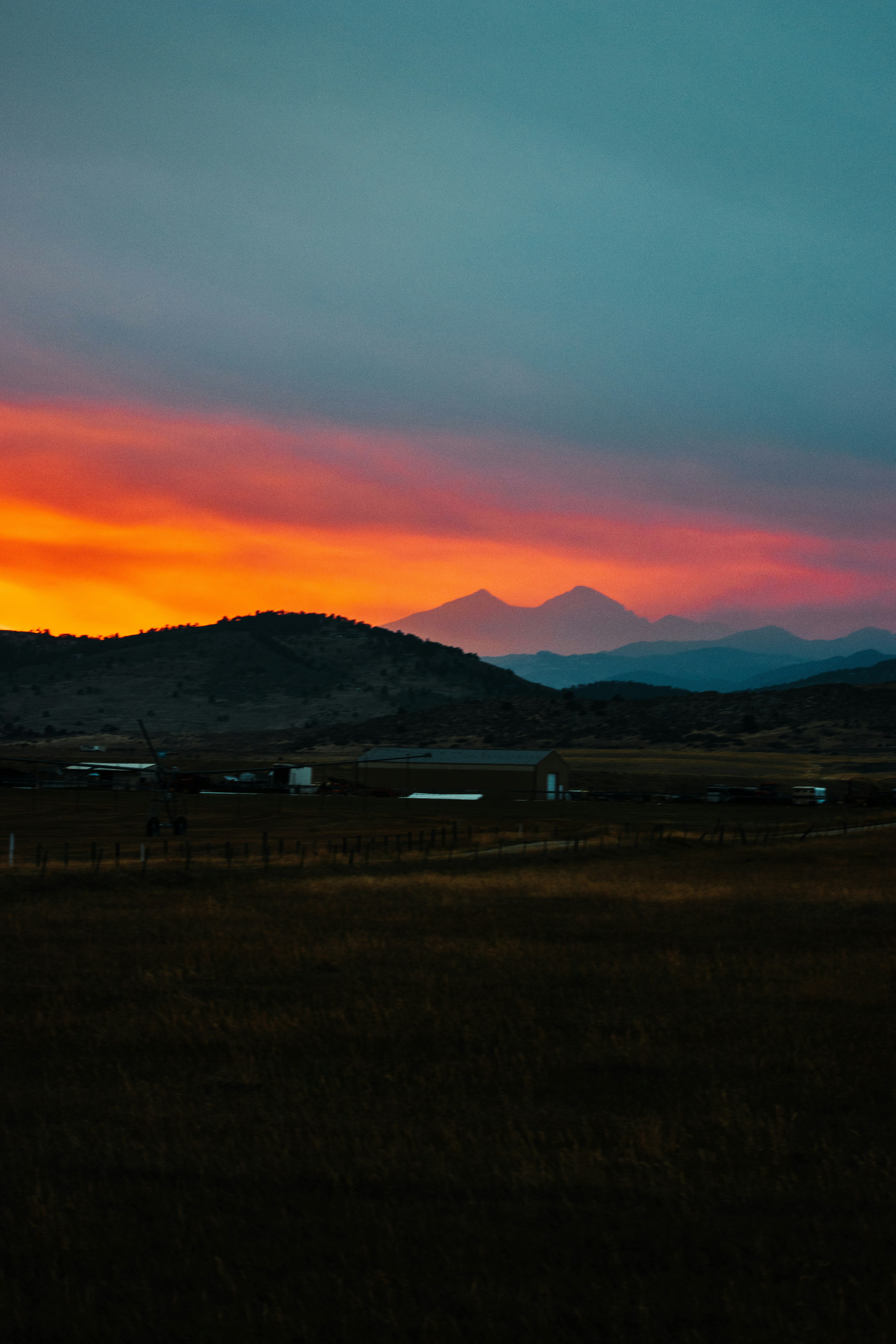 silhouette of mountains during sunset