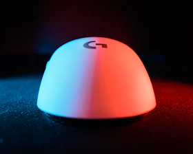 Close-up of a custom mouse pad featuring a vibrant company logo design.