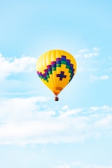 A vibrant hot air balloon soaring high in the sky.