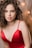 woman in red spaghetti strap top