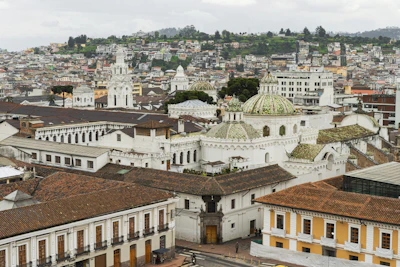 The white walls and red roofs of Quito’s colonial old town from above