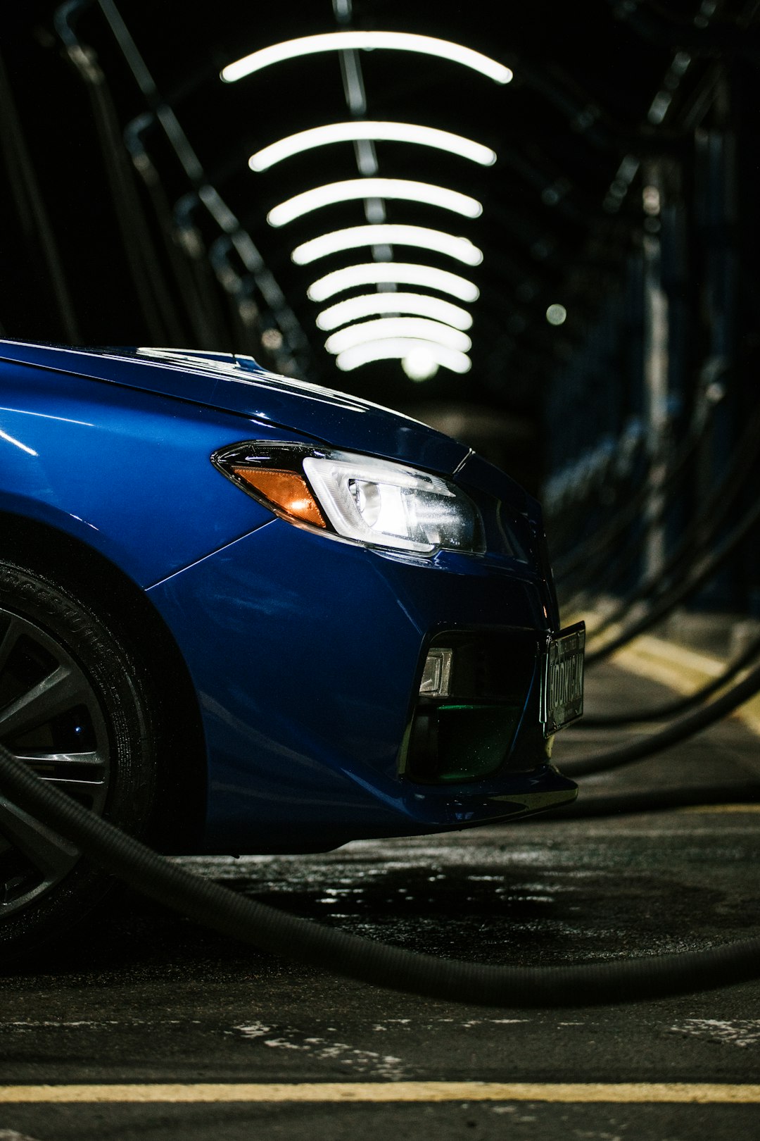 blue car on road during daytime